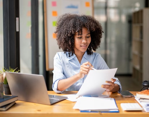 Happy Black Woman at Laptop