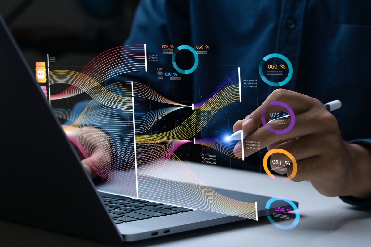 Project manager using AI tools to analyze project data on a laptop